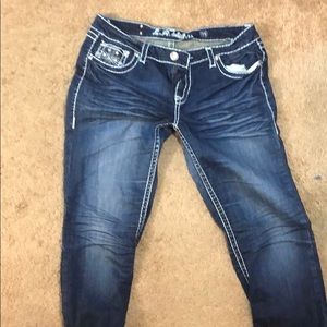 Blue jeans with white stitch outline